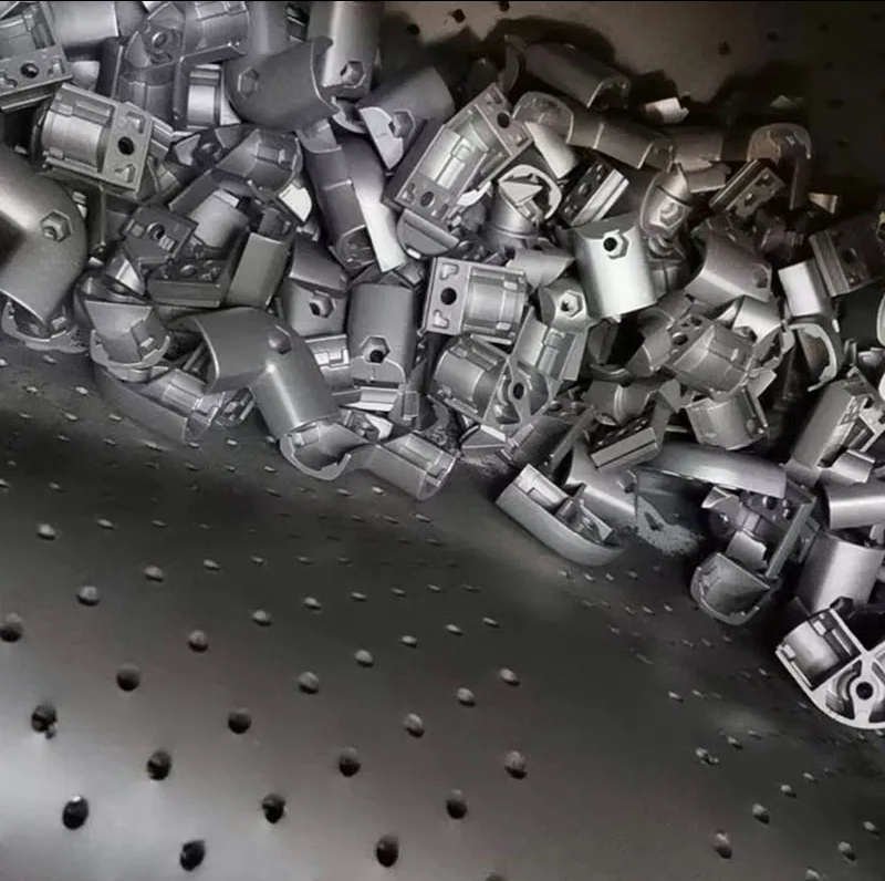 Tumble belt shot blasting machine mainly suitable for blasting, rust removal, oxide skin removal and surface strengthening of many varieties, large and medium-sized batch production.