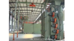 Spinner hanger blast machines are generally used in the foundry or forging industry as well as in steel construction, where heavy or large-volume work pieces as well as solid steel parts need to be processed.