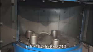 turntable shot blasting machine is a surface treatment system in which workpieces are placed on a rotating table inside a blasting chamber. As the table rotates, high-speed blast wheels project steel shots onto the surface, removing rust, scale, and contaminants.